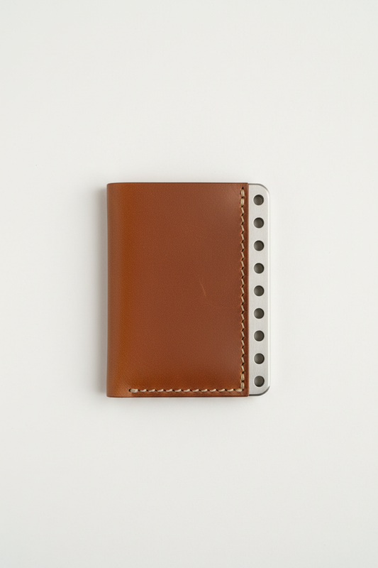 MEKIN W1 Card Wallet — natural brown leather with CNC-cut steel spine, hand saddle-stitched