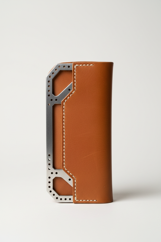 MEKIN G1 Glasses Case — natural brown leather with CNC-cut steel structural frame, hand saddle-stitched